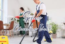 Bright and organized living room during Spring cleaning with cleaning supplies and fresh plants