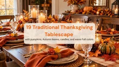 Traditional Thanksgiving tablescape with pumpkins, autumn leaves, candles, and warm fall colors